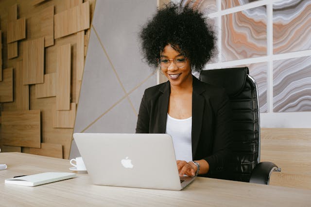 a business person working on their computer at their desk